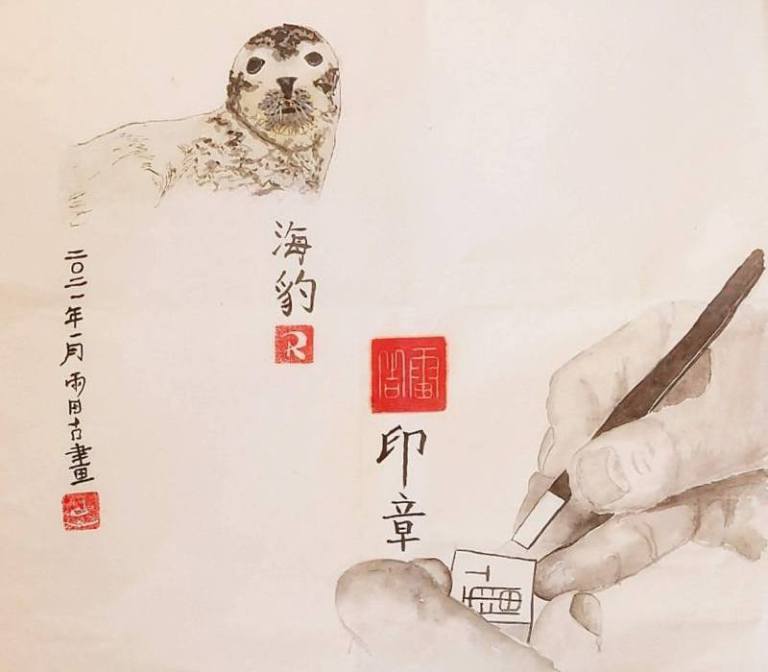 Carving a seal - Reg Robinson 2021